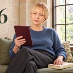 666 and the “Law of Attraction”: Where the Fear Came From and What the Number Can Do for You Woman reading a burgundy tablet beside the digits 666 in a library alcove.
